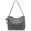 Bolsa de balde retrô Maillard elegante e sofisticada para mulheres, 2026, adequada para trabalho, deslocamento e escola, com grande capacidade e projetada como bolsa de ombro.