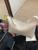 Bolsa de Mão Pequena de Luxo Transfronteiriça para Mulheres, Nova Moda de Verão 2025 Bolsa Versátil de Ombro Transversal, Bolsa Dumpling Super Popular