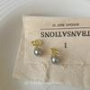 Aretes de nudo populares en línea Aretes de lujo ligero de alta gama geométricos simples clip para la oreja Sin perforación Aretes de piedra Ojo de Tigre