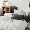 Fábrica direta simples de cor sólida dupla lixamento conjunto de quatro peças de cama de algodão lavado colcha de estudantes cobrir uma geração de cabelo