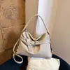Bolsa grande casual urbana para mulheres, bolsa de ombro de nicho moderna e versátil, bolsa tote de grande capacidade para aula e trajeto, bolsa de axila