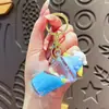 Llavero Creativo de Sanrio de Té de Burbujas con Cuentas Infundidas en Aceite, Botella Linda de Arena Líquida de Dibujos Animados, Colgante para Bolso de Niña Regalo