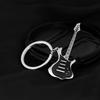 Exclusivamente transfronterizo para venta al por mayor, en stock, colgante de instrumento musical creativo, bolsa de regalo, adornos, llavero de guitarra con pintura de metal.