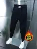Calças casuais de inverno masculinas estilo coreano calças esportivas da moda com forro de lã calças da moda de nove comprimentos calças elásticas masculinas