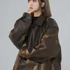 Chaqueta de cuero vintage versátil para hombres y mujeres, nuevo estilo de primavera, cuero PU de motocicleta, corte holgado, moderna y de alta gama