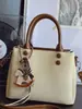 Bolso Pequeño Cuadrado Casual de Nicho Estilo Coreano para Mujer, Nuevo Elegante Bolso de Hombro Cruzado de Alto Valor Primavera 2026