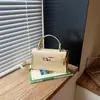 Diseño de Nicho Exquisito de Alta Gama Transfronterizo Nuevo Bolso Cuadrado Pequeño de Hombro Cruzado Simple y Elegante para Mujer Primavera/Verano 2026