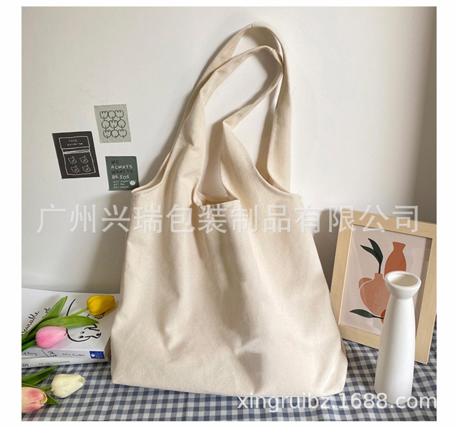 新款上课大学生小众单肩帆布包_06.jpg