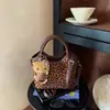 Bolsa de Mão Feminina de Alta Qualidade Transfronteiriça Temperamento Tendência Compras na Rua Deslocamento Bolsa de Ombro Único Transversal Bolsa de Balde Retrô de Mão
