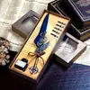 Pavo Real Azul mecánico punk alas pluma pluma de inmersión tinta regalo publicitario pluma de ave set de plumas