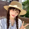 Sombrero de paja de ala plana con lazo calado estilo francés para mujer, elegante sombrero de verano para la costa y la playa, sombrero para el sol con protección solar