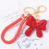 Llavero de Arco de Arcilla Cordón de Cuero Pequeño Regalo Pedrería Colgante de Llave de Metal Yiwu Pequeño Artículo Mayorista Transfronterizo