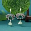 Pendientes de estilo étnico vintage de imitación de jade hetiano, orquídea magnolia Xiangyun, estilo antiguo, nuevos pendientes de moda de lujo ligeros de estilo chino.