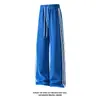 Colección Otoño 2026: Pantalón de chándal con base blanca, estampado de escamas de dragón y tres rayas, tallas M-5XL, HK26990-Especial P32