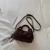Exquisito bolso retro de gamuza de nicho para mujer, nuevo modelo 2026, bolso cruzado casual versátil, bolso de mano pequeño súper popular