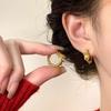 Aretes año del dragón retro lujo ligero patrón de dragón enrollado hebilla de oreja diseño de nicho aretes de temperamento único aretes de moda y tendencia