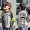 Ropa de otoño para niños de manga larga 100% algodón 2026 nuevo estilo raglán con bloques de color informal cuello redondo moderno y genial