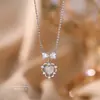 Collar de Plata Pura S999 con Lazo y Corazón para Mujer, Moda de Nicho Versátil Diseño de Lujo Ligero Cadena para Clavícula Hueca Accesorio