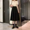 Novo estilo para início do outono, tamanho grande, cintura alta, saia emagrecedora, saia preta feminina evasê midi de um passo, saia de quadril para gordinhas