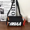 2026 Nova Bolsa para Homens e Mulheres Casais Bolsa de Ombro Único Bolsa Transversal Bolsa de Tecido de Nylon Versátil Carta Estilo Esportivo Fashionável Versátil