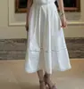 Traje de Moda Ins26 Coreano para Mujer, Camisa de Encaje con Perlas de Manga Corta de Principios de Primavera + Falda con Panel de Encaje