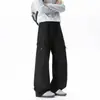 Pantalones cargo beige de pierna ancha con cordón para hombre, estilo outdoor, con grandes bolsillos con cremallera, corte holgado, caída fluida, casual, pantalones de largo completo