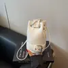 Bolso tipo cubo moderno y versátil para mujer 2025 Nuevo elegante y único Bolso de hombro cruzado Bolso pequeño de verano