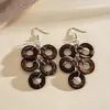Pendientes de borla con carcasa de madera marrón transfronterizos europeos y americanos, pendientes de estilo vintage Maillard, pendientes de mujer de lujo ligero de alta gama