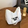 Nova Bolsa Transversal Estilosa 2025 Bolsa de Ombro de Lona Fashion Versátil para Mulheres Sensação de Alto Padrão Grande Capacidade Bolsa com Letras