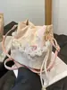 Nuevo bolso de estilo chino, nuevo bolso de cubo bordado de estilo nacional de alta gama, bolso de mano con cuentas, bolso cruzado de hombro para mujer