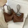 Bolsa Grande Estilo Coreano Retrô para Mulheres 2026 Nova Moda Bolsa Tote Simples para o Dia a Dia Bolsa Transversal com Textura Casual