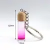 Creativo Nuevo Color Degradado Madera Grano Cubierta Vidrio Pequeña Botella Colgante Aceite Esencial Botella de Perfume Llavero Colgante Collar