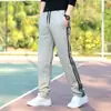 Pantalones Casuales para Hombre Primavera y Verano Pantalones Deportivos de Tres Rayas Casual Versátil Sueltos Talla Grande Pierna Recta Pantalones Largos Modernos