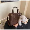 Cross2026 Verano Nuevo Estilo Popular de Este Año El Bolso Pequeño Más Vendido para Mujer Retro Versátil Súper Popular Bolso Cruzado Bolso Cubo