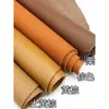 Camada superior material de couro bovino tecido de couro couro marrom escuro marrom amarelado sofá cor de castanha cabeceira de cama tecido de couro macio