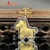 Colgantes de regalo para teléfono móvil al por mayor, juego de llaveros dorados, incluyendo colgantes dorados para el Año del Caballo, para riqueza y prosperidad instantáneas