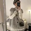 Chaleco de punto vintage de un solo botón estilo francés para mujer, nuevo suéter en capas otoño e invierno 2026, top exterior holgado