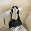 A bolsa feminina popular de grande capacidade deste ano, nova coleção de inverno 2026, bolsa tote casual vintage para ombro, moda