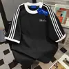 Camiseta Trendy Estilo Americano de Manga Curta com Design Color-Blocking, Nova Blusa com Estampa de Letras Verão 2026, Ins