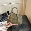 Bolso de Mano para Mujer con Textura Única Modelo Nuevo 2025 Bolso Tote Pequeño Simple Versátil Bolso de Hombro Cruzado Venta al por Mayor