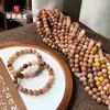 Xinjiang Hotan Seda Dorada Jade Tianshan Verde Color Azúcar Siete Colores Jade Natural DIY Pulsera Círculo Único Pulsera de Bolas Redondas Venta al por Mayor