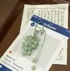 Item Popular Xiaohongshu Novo Estilo Chinês Cor Uva Bolsa que Muda de Cor Corrente para Celular Pingente de Uva Produto Acabado
