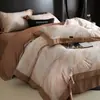 Nuevo juego de ropa de cama de cuatro piezas de algodón de fibra larga cepillado, con 60 hilos, que ofrece una sensación lujosa y de alta gama, disponible en estilos de sábana plana, sábana ajustable y colcha de algodón puro