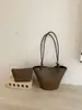 Bolsa tote de textura tecida de nicho transfronteiriça feminina nova estilosa retrô grande capacidade ombro único super quente para deslocamento bolsa mãe e filho