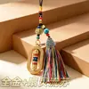 Joia de liga metálica estilo étnico chinês, pingente decorativo de vajra oval giratório, lembrança de viagem atacado