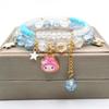 Nuevo brazalete infantil de dibujos animados Sanrio con cuentas de cristal de colores, melodía, para estudiantes, popular en internet, fabricantes al por mayor