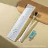 Cepillo de Dientes Desechable con Pasta Dental Dos en Uno Set de Cepillos de Dientes Venta al por Mayor Artículos de Tocador para Habitación de Hotel