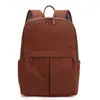 Design de estilo simples senso de design mochila de viagem para o trabalho e escola tecido de nylon à prova d'água versátil moderna mochila de estilo liso para mulheres