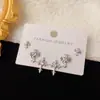 Moda Japonesa e Coreana Conjunto Três Peças de Brincos Cruzados Totalmente Cravejados para Mulheres, Design Versátil de Luxo Leve Exquisito Brincos Super Brilhantes Atacado