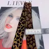 [Suministro directo de fábrica] top de cintura para mujer con estampado de leopardo amarillo terroso banda elástica tejido jacquard de color banda elástica para cintura de pantalón cabeza de falda goma
